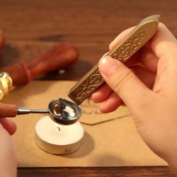 Barra de lacre dorada